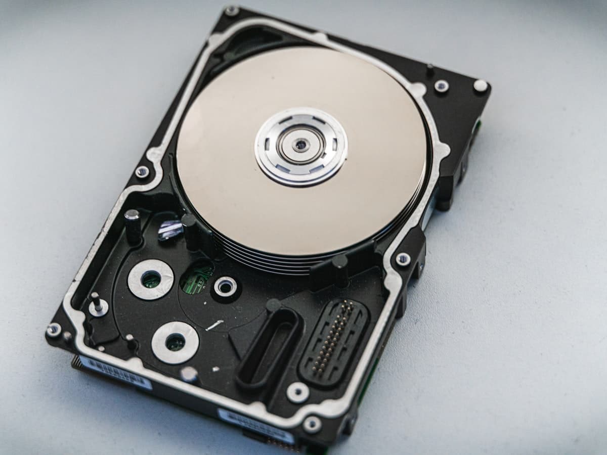 A bare hard drive up close — the kind we pull data back from