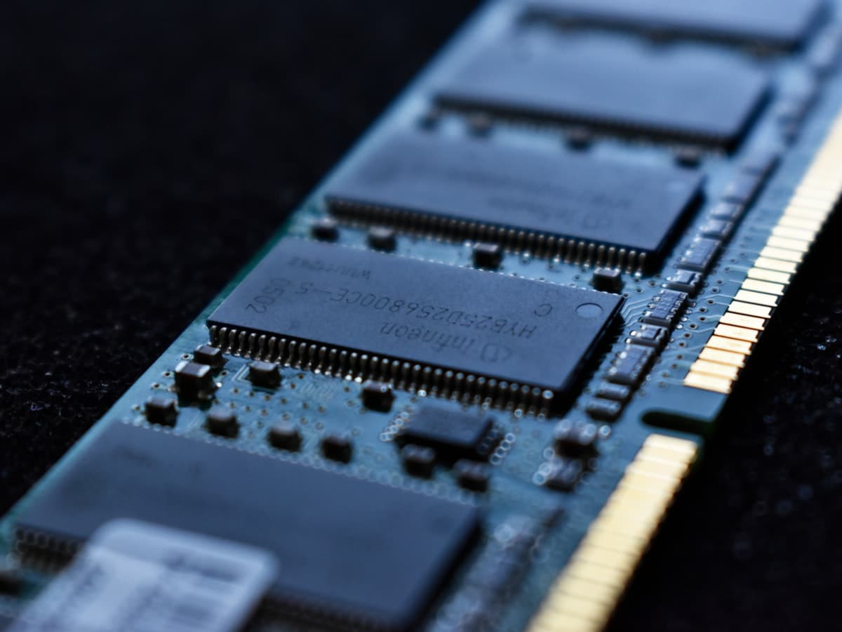 A stick of computer memory up close, ready to install